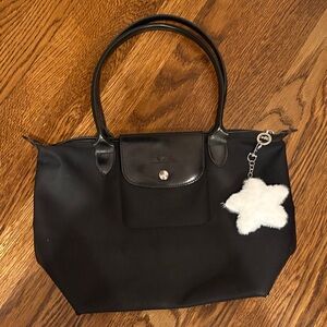 Longchamp Black Tote 
zipper broken but can be fixed